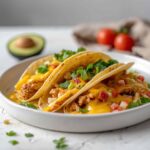 Slow Cooker Queso Chicken Tacos
